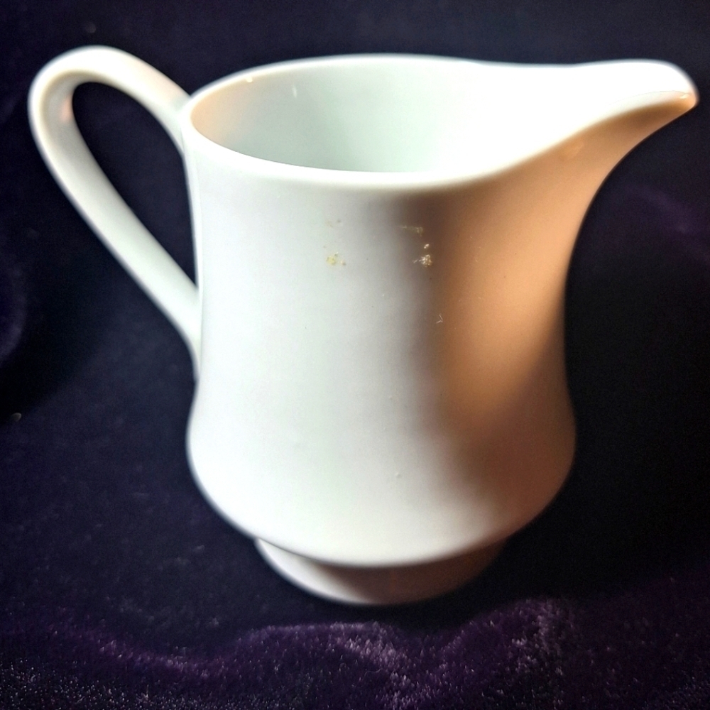 White porcelain creamer